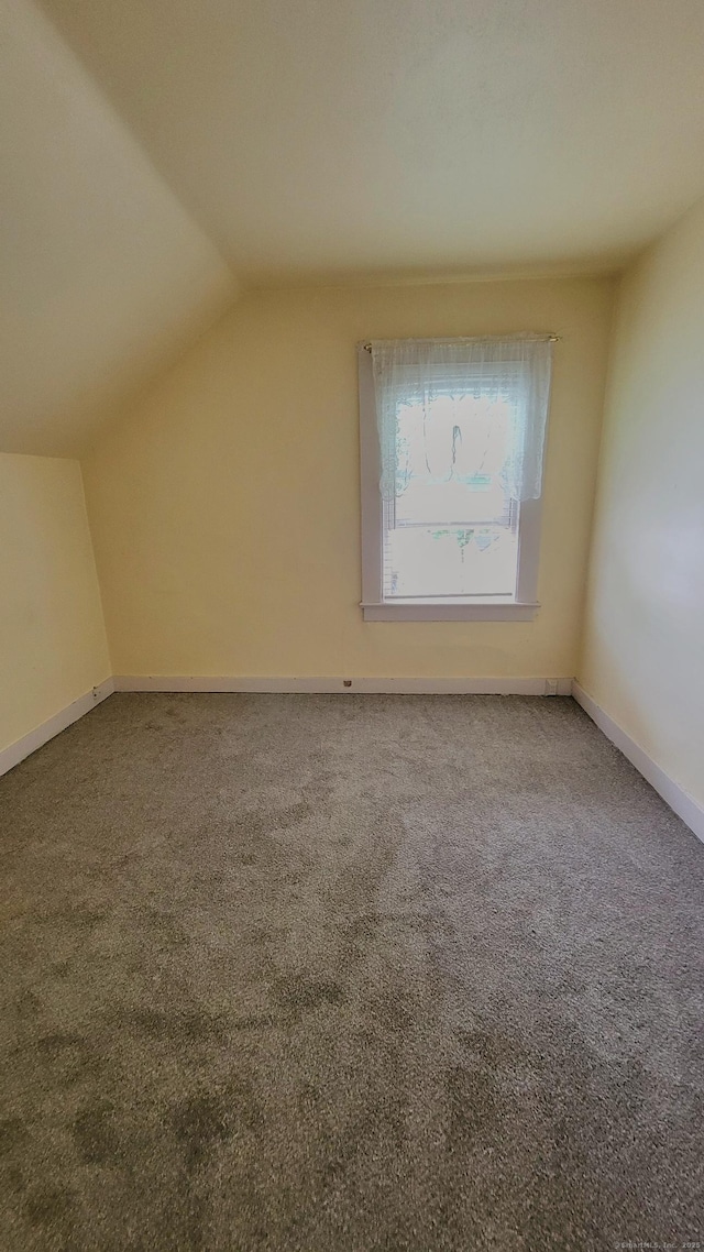 909 N Colony Rd, Meriden, CT 06450 - bonus room with vaulted ceiling, carpet, and baseboards