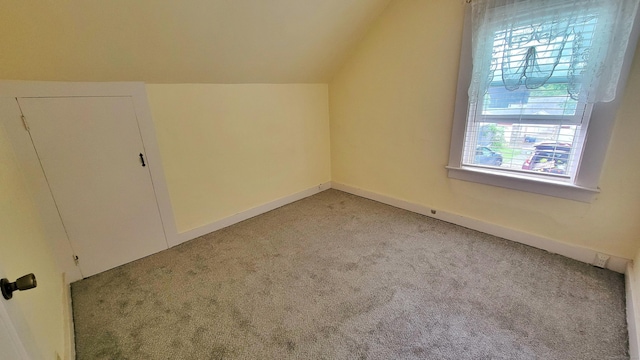 909 N Colony Rd, Meriden, CT 06450 - bonus room featuring light carpet, lofted ceiling, and baseboards