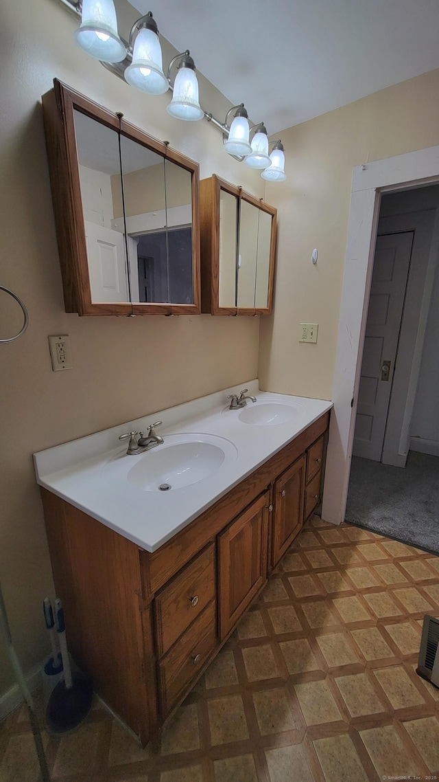 909 N Colony Rd, Meriden, CT 06450 - bathroom with double vanity and tile patterned floors