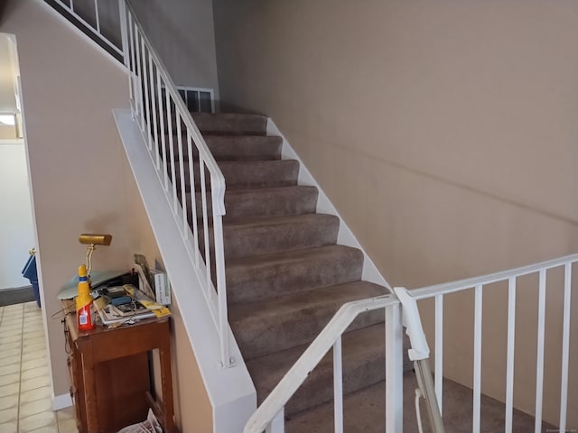 60 Engine House Rd Unit D, Stratford, CT 06614 - stairway featuring tile patterned flooring