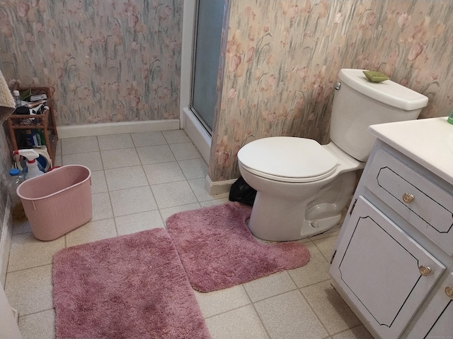60 Engine House Rd Unit D, Stratford, CT 06614 - bathroom featuring wallpapered walls, vanity, a shower with shower door, and tile patterned flooring