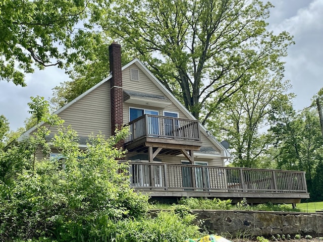 52 Lake View Ave, Salem, CT 06420 - rear view of property with a balcony, a chimney, and a wooden deck