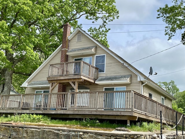 52 Lake View Ave, Salem, CT 06420 - rear view of house with a balcony, a chimney, and a wooden deck