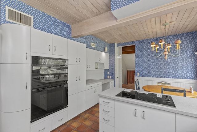1 Indian Spring Ln, Norwich, CT 06360 - kitchen featuring wallpapered walls, black appliances, wainscoting, light countertops, and wood ceiling with exposed beams