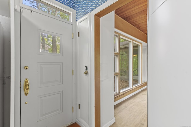1 Indian Spring Ln, Norwich, CT 06360 - foyer featuring light wood-style flooring, wooden ceiling, and wallpapered walls