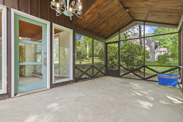 1 Indian Spring Ln, Norwich, CT 06360 - unfurnished sunroom with vaulted ceiling, a chandelier, and plenty of natural light