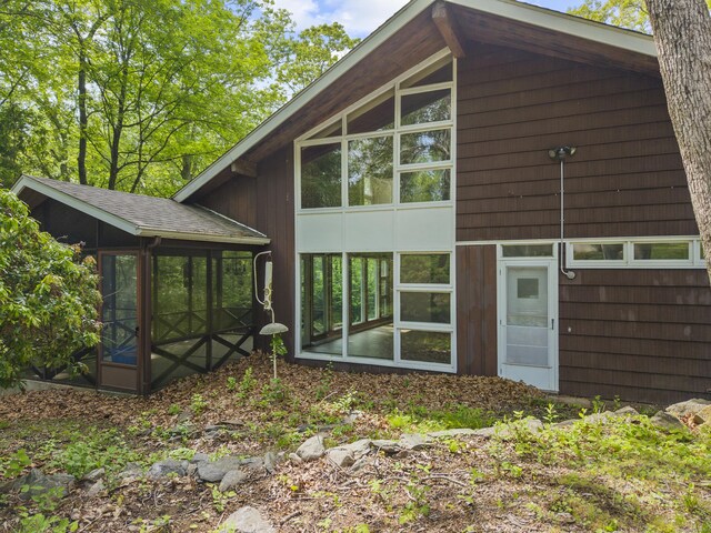 1 Indian Spring Ln, Norwich, CT 06360 - rear view of house with a sunroom