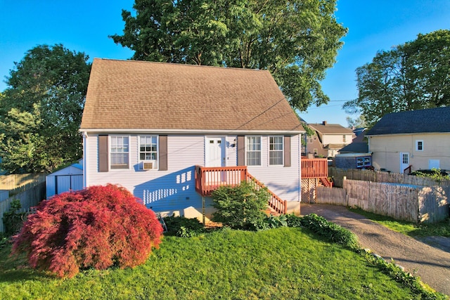 view of front of home with roof with shingles