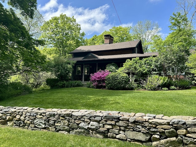 3 Halletts Rd, New Milford, CT 06776 - view of front of property with a chimney, a front lawn, and roof with shingles