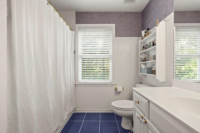 23 Mckeon Pl, Ridgefield, CT 06877 - full bathroom featuring tile patterned flooring, toilet, vanity, and healthy amount of natural light