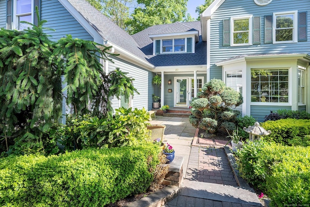 23 Mckeon Pl, Ridgefield, CT 06877 - doorway to property with a shingled roof