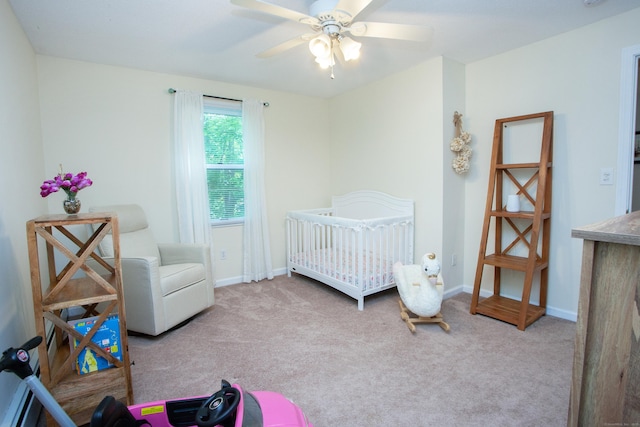 69 Fernwood Dr, Simsbury, CT 06070 - bedroom featuring carpet floors, baseboards, a ceiling fan, and a nursery area