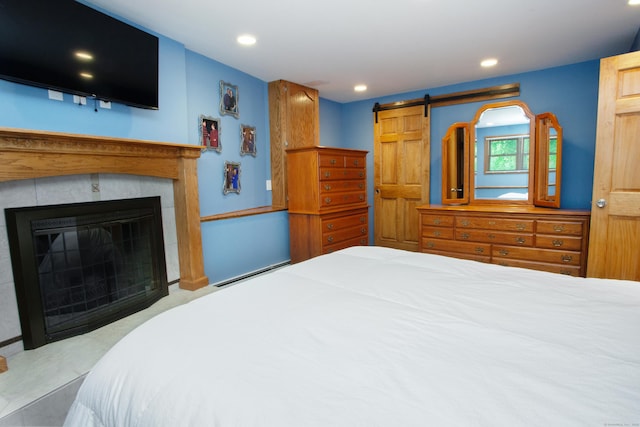 69 Fernwood Dr, Simsbury, CT 06070 - bedroom with recessed lighting, a baseboard heating unit, and a fireplace