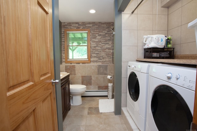 69 Fernwood Dr, Simsbury, CT 06070 - laundry room featuring washer and dryer, a baseboard radiator, tile walls, and recessed lighting