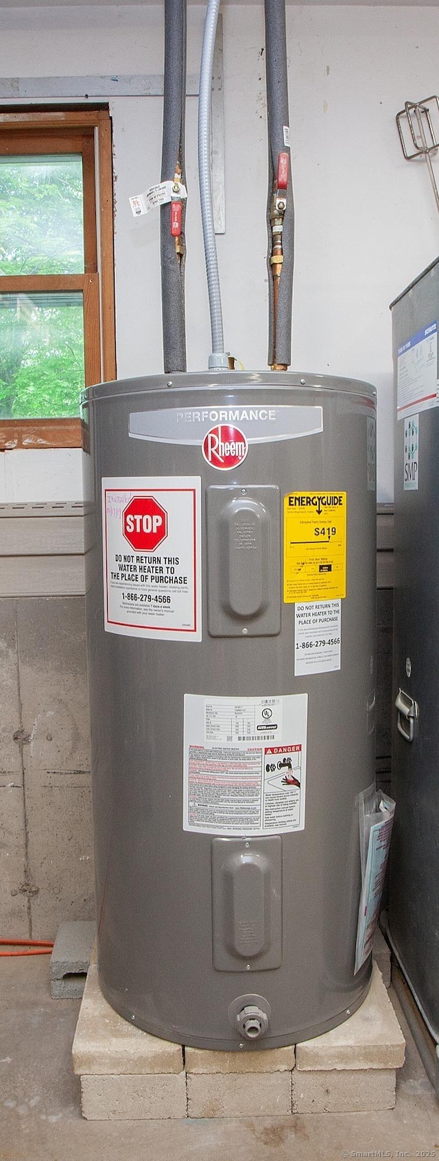 69 Fernwood Dr, Simsbury, CT 06070 - utility room featuring water heater