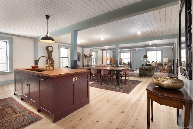 14 Main St, Salisbury, CT 06039 - kitchen with wood counters, a sink, open floor plan, plenty of natural light, and wooden ceiling with exposed beams