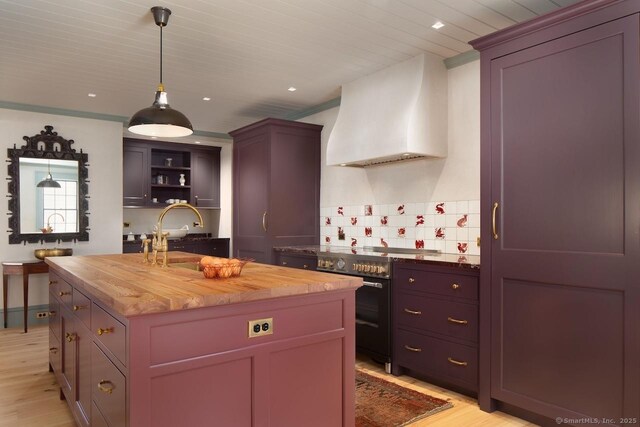 14 Main St, Salisbury, CT 06039 - kitchen featuring custom exhaust hood, butcher block countertops, stainless steel stove, a sink, and wooden ceiling