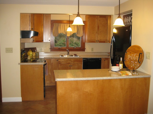 1071 River Blvd, Suffield, CT 06078 - kitchen featuring black appliances, a sink, under cabinet range hood, brown cabinetry, and a peninsula
