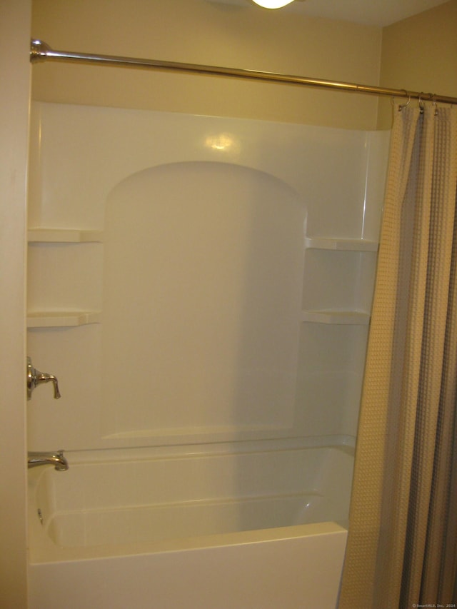 1071 River Blvd, Suffield, CT 06078 - bathroom featuring shower / tub combo with curtain