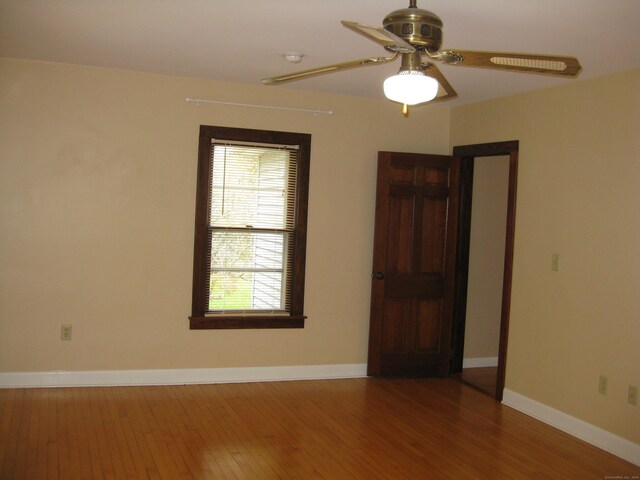 1071 River Blvd, Suffield, CT 06078 - unfurnished room with ceiling fan, wood finished floors, and baseboards