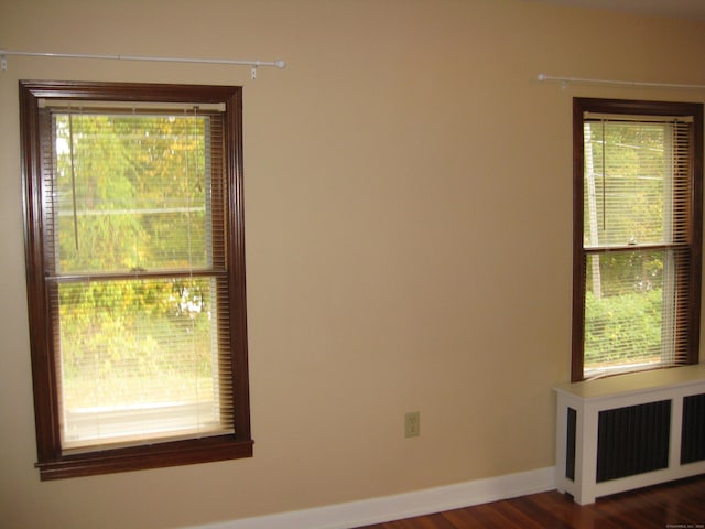 1071 River Blvd, Suffield, CT 06078 - unfurnished room with radiator, wood finished floors, and baseboards