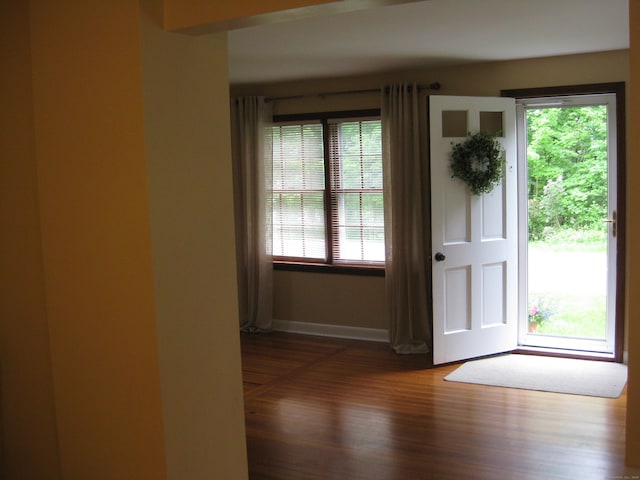 1071 River Blvd, Suffield, CT 06078 - doorway to outside featuring baseboards and wood finished floors