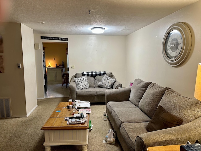47 Conestoga Way Unit 47, Glastonbury, CT 06033 - carpeted living area featuring a textured ceiling and baseboards