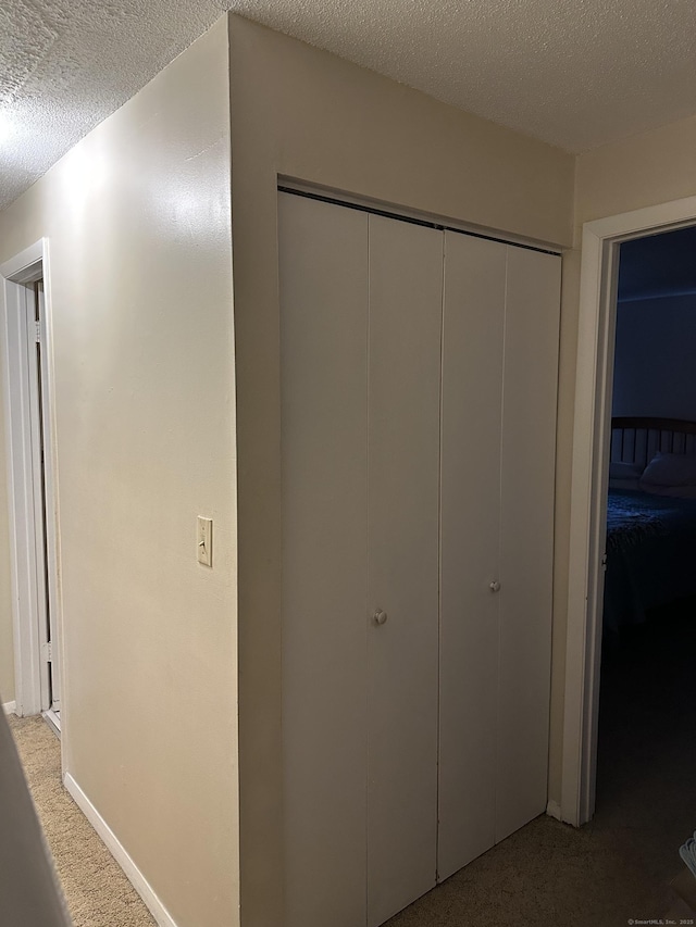 47 Conestoga Way Unit 47, Glastonbury, CT 06033 - hall featuring carpet floors and a textured ceiling