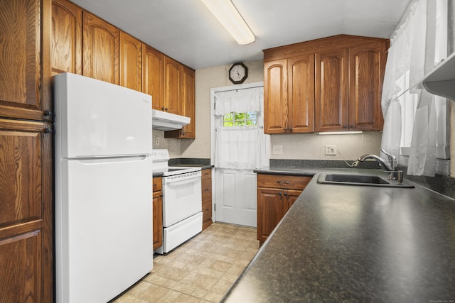 34 Benedict Dr, South Windsor, CT 06074 - kitchen featuring white appliances, under cabinet range hood, dark countertops, and brown cabinets