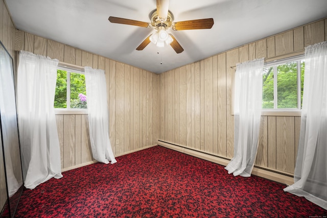 34 Benedict Dr, South Windsor, CT 06074 - carpeted spare room with wood walls and a ceiling fan