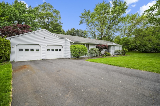 34 Benedict Dr, South Windsor, CT 06074 - view of front of property with a garage, driveway, and a front yard
