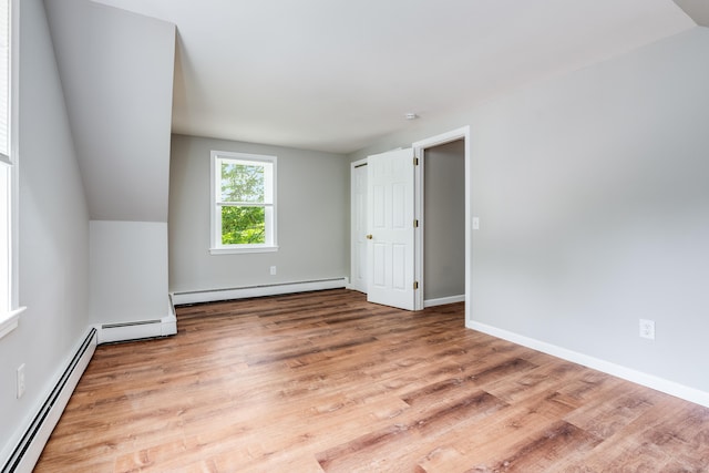 143 Clark Hill Rd, East Haddam, CT 06423 - spare room featuring a baseboard heating unit, a baseboard radiator, wood finished floors, and baseboards