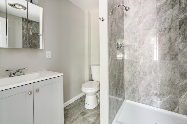 143 Clark Hill Rd, East Haddam, CT 06423 - bathroom featuring toilet, vanity, tiled shower, and baseboards