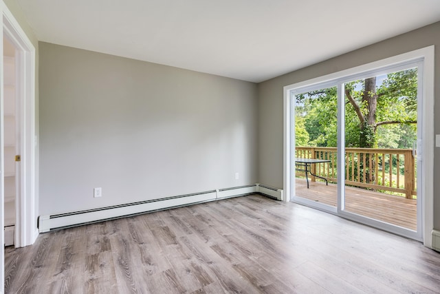 143 Clark Hill Rd, East Haddam, CT 06423 - unfurnished room featuring a baseboard radiator and wood finished floors
