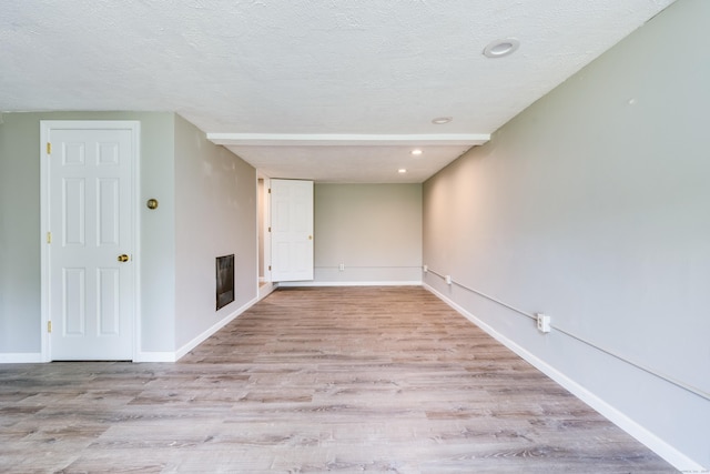 143 Clark Hill Rd, East Haddam, CT 06423 - empty room featuring wood finished floors, baseboards, recessed lighting, and a textured ceiling