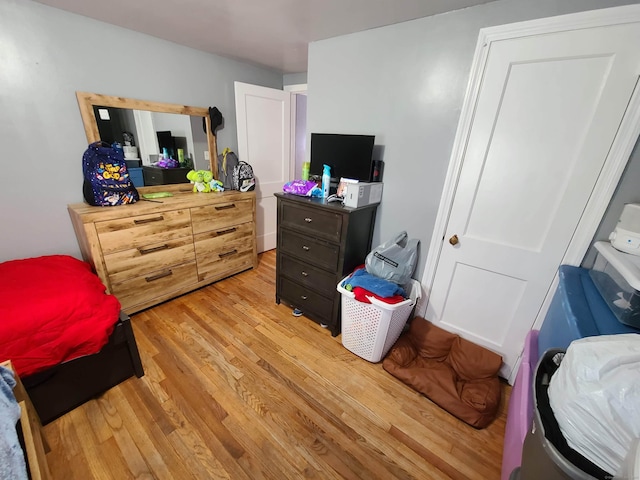 1437 Silver Ln, East Hartford, CT 06118 - bedroom with light wood-style flooring