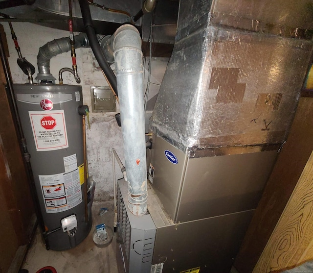 1437 Silver Ln, East Hartford, CT 06118 - utility room with gas water heater and heating unit