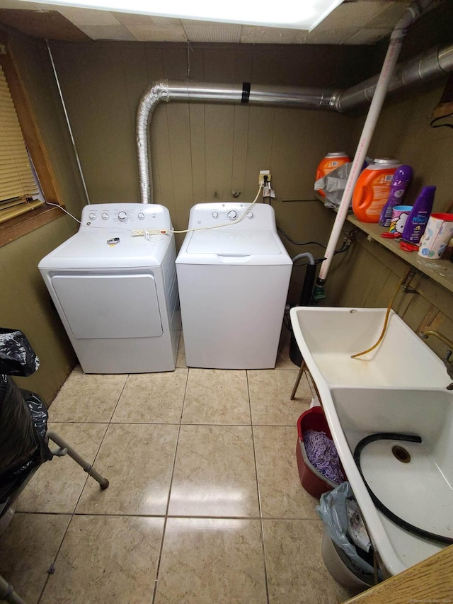 1437 Silver Ln, East Hartford, CT 06118 - laundry area with independent washer and dryer and tile patterned floors