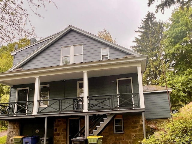 179 Rhode Island Ave, Waterbury, CT 06704 - rear view of house with stone siding and stairs