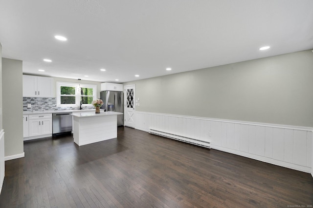 2 Broken Arrow Dr, East Granby, CT 06026 - kitchen featuring baseboard heating, stainless steel appliances, a kitchen island, dark wood-type flooring, and recessed lighting