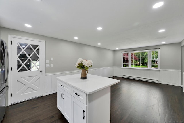 2 Broken Arrow Dr, East Granby, CT 06026 - kitchen featuring a baseboard radiator, a wainscoted wall, dark wood finished floors, white cabinetry, and light countertops