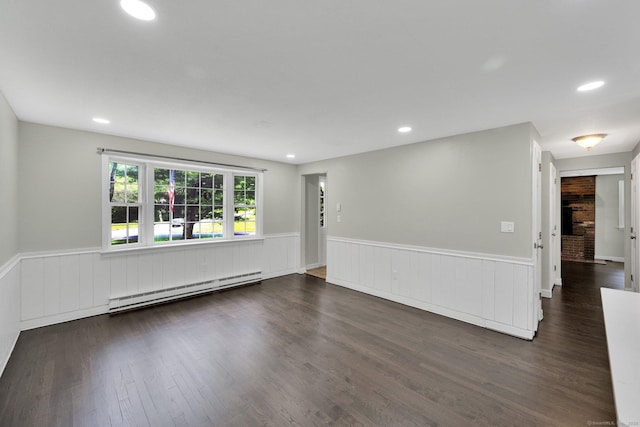 2 Broken Arrow Dr, East Granby, CT 06026 - spare room with a baseboard radiator, wainscoting, dark wood finished floors, and recessed lighting