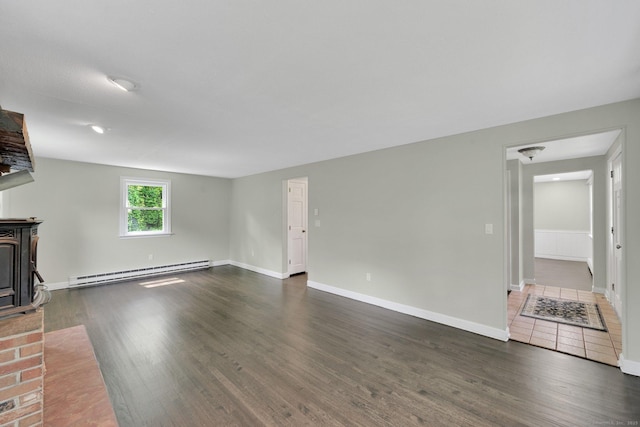 2 Broken Arrow Dr, East Granby, CT 06026 - unfurnished living room with a baseboard heating unit, wood finished floors, and baseboards