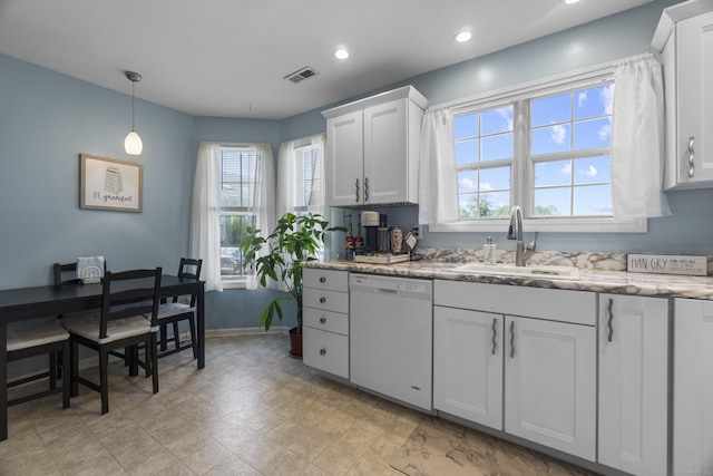 75 Redwood Dr Unit 1302, East Haven, CT 06513 - kitchen featuring dishwasher, a sink, plenty of natural light, baseboards, and recessed lighting