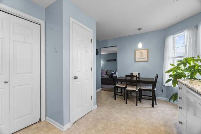 75 Redwood Dr Unit 1302, East Haven, CT 06513 - dining space with baseboards