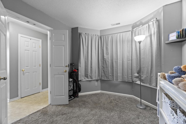 75 Redwood Dr Unit 1302, East Haven, CT 06513 - interior space featuring a textured ceiling and baseboards