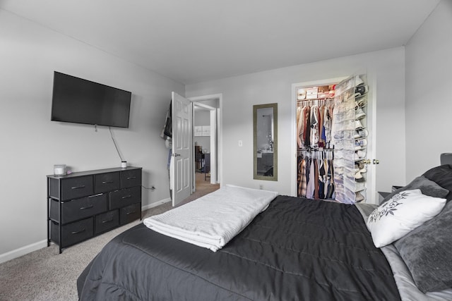 75 Redwood Dr Unit 1302, East Haven, CT 06513 - carpeted bedroom with baseboards, a walk in closet, and a closet