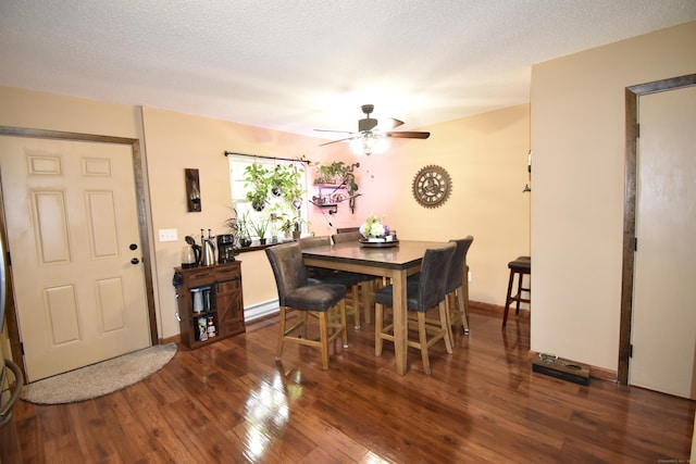 143 Pine Hill Rd Unit 8B, Thomaston, CT 06787 - dining area with a baseboard heating unit, a ceiling fan, and wood finished floors