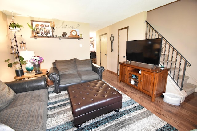 143 Pine Hill Rd Unit 8B, Thomaston, CT 06787 - living area featuring wood finished floors, stairs, and baseboards