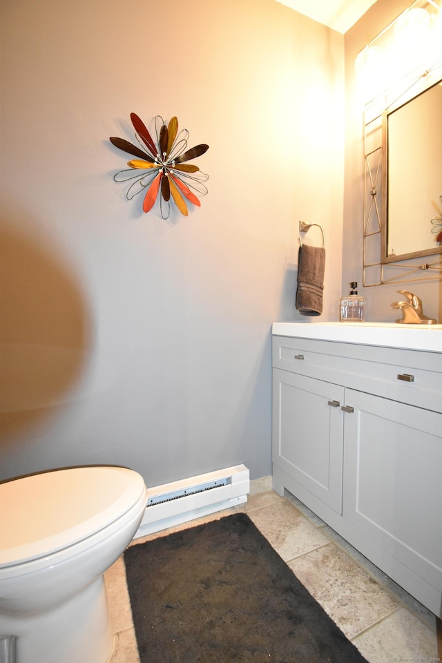 143 Pine Hill Rd Unit 8B, Thomaston, CT 06787 - half bathroom with baseboard heating, toilet, vanity, ceiling fan, and baseboards